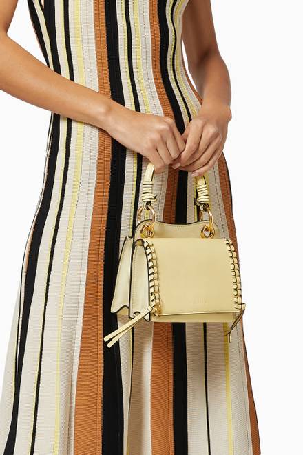 hover state of Mini Tilda Crossbody Bag in Smooth & Suede Cowhide      