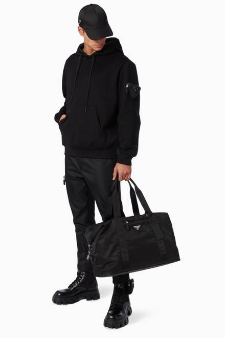 hover state of Triangle Logo Duffle Bag in Nylon & Saffiano Leather
