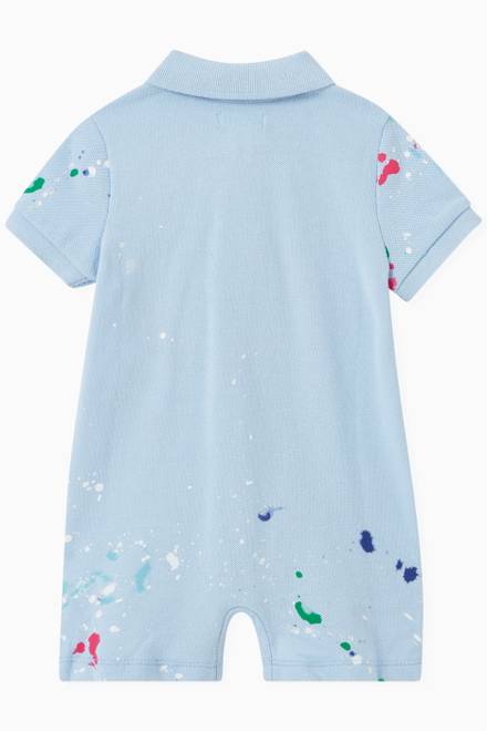 hover state of Paint Splatter Polo Romper in Cotton Piqué