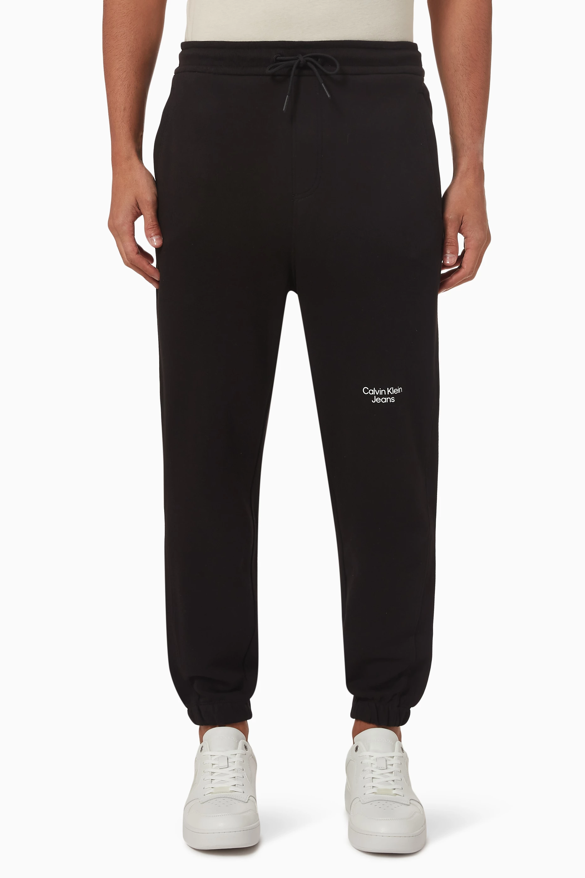 Shop Calvin Klein Jeans Black Logo Sweatpants in Cotton Terry for MEN |  Ounass Oman